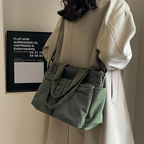 Bolso con varios compartimentos y diseño informal ideal para el día a día y para viajar®