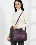 Bolso con múltiples compartimentos y textura suave®