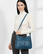 Bolso con múltiples compartimentos y textura suave®
