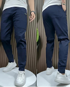 Pantalones elásticos premium ajustados para hombre®
