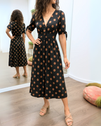 Vestido de lunares con escote en V cruzado®