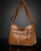 Bolso con múltiples compartimentos y textura suave®