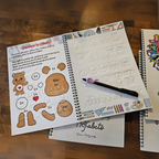 Manuales de escritura con ranuras guiadas y tinta mágica para el aprendizaje