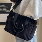 Bolso con varios compartimentos y diseño informal ideal para el día a día y para viajar®