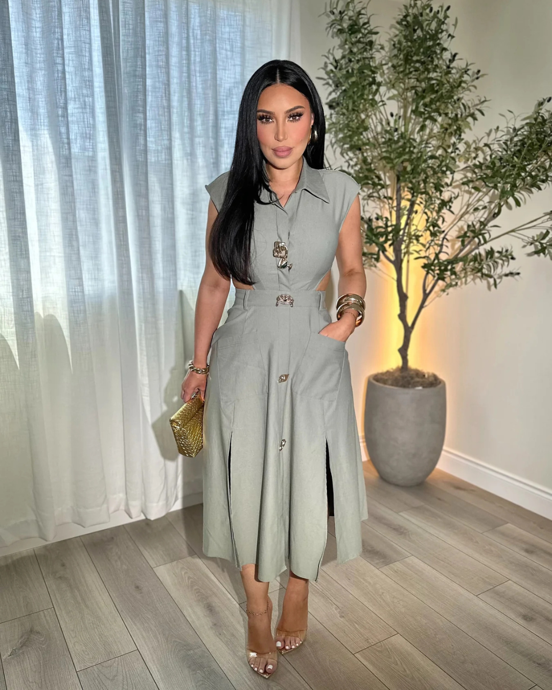 Elegante vestido sin mangas con botones decorativos®