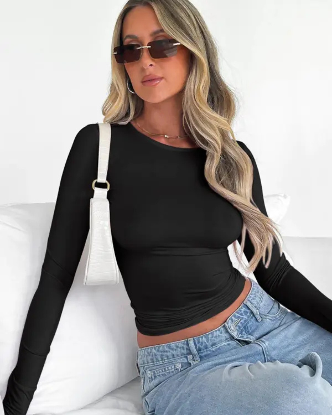 Camiseta corta ceñida de manga larga para mujer