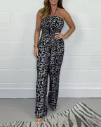 Mono estampado sin tirantes con escote halter y perneras anchas®