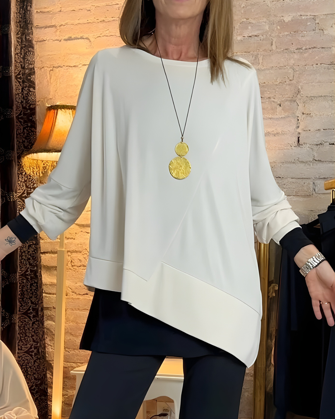 Jersey asimétrico de diseño elegante para mujer