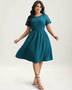 Vestido con bolsillos y mangas cortas con aberturas de encaje®