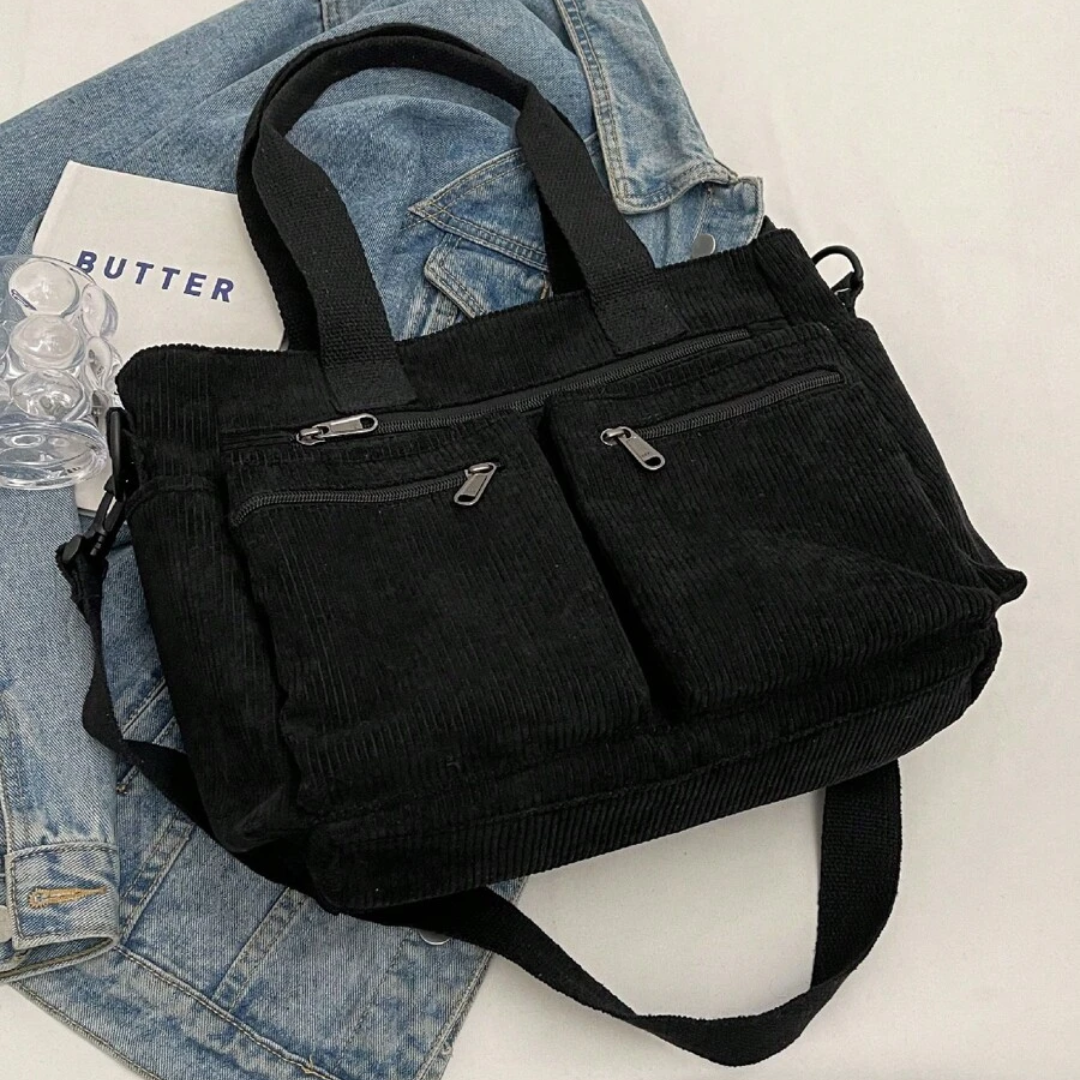 Bolso con varios compartimentos y diseño informal ideal para el día a día y para viajar®