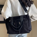 Bolso con varios compartimentos y diseño informal ideal para el día a día y para viajar®