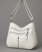 Bolso con múltiples compartimentos y textura suave®