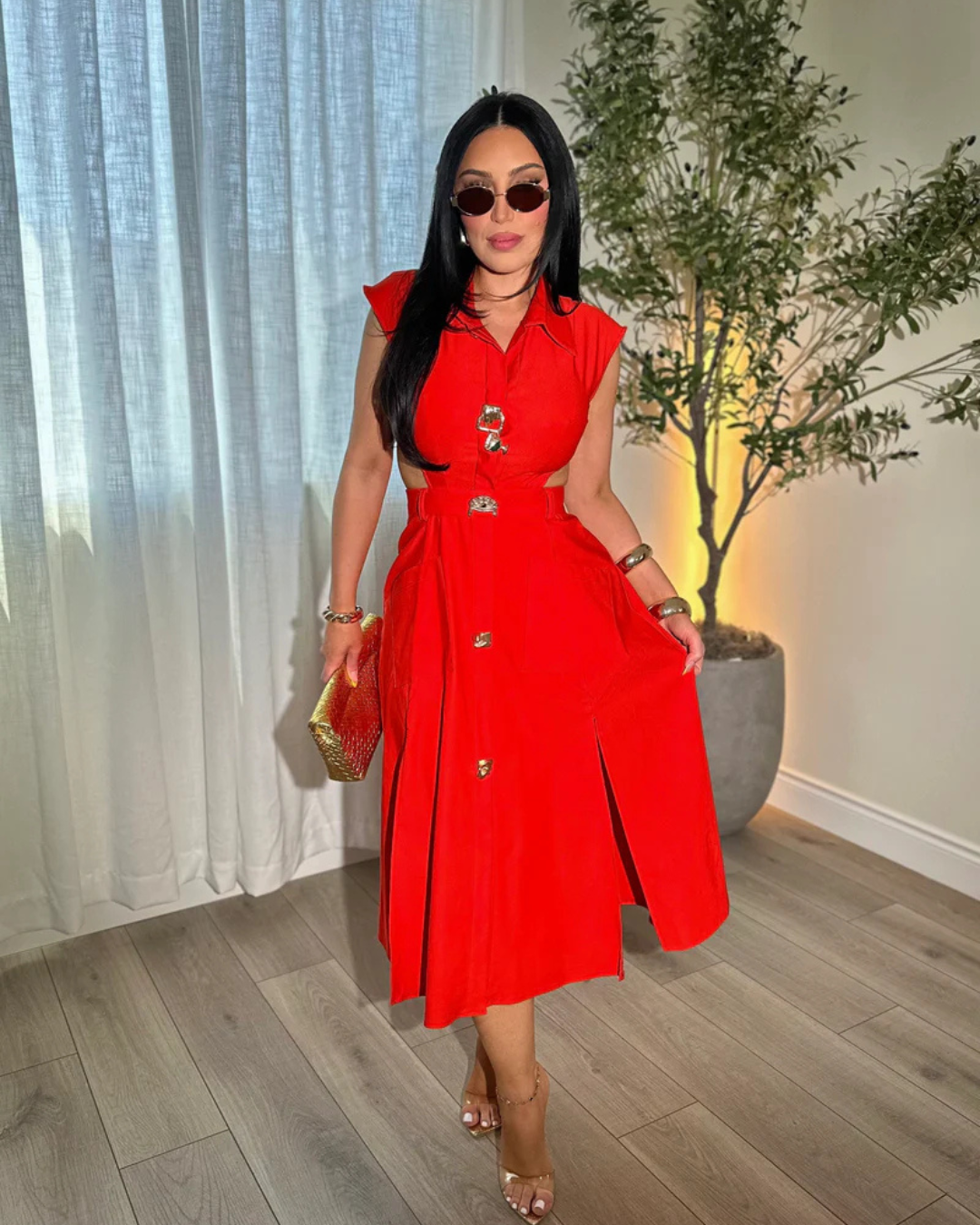 Elegante vestido sin mangas con botones decorativos®