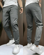 Pantalones elásticos premium ajustados para hombre®