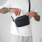 Bolso bandolera de cuero sintético con bolsillo frontal para hombre