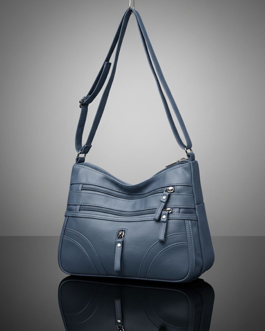 Bolso con múltiples compartimentos y textura suave®