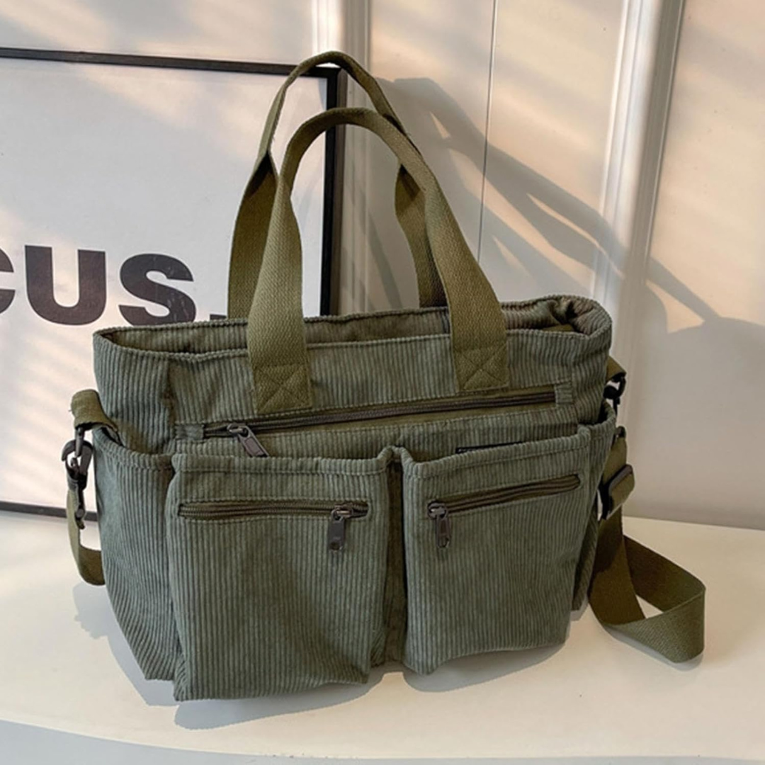 Bolso con varios compartimentos y diseño informal ideal para el día a día y para viajar®