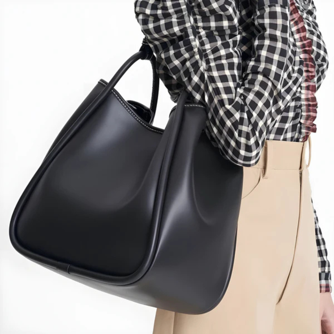 Elegante bolso bandolera de cuero sintético con diseño espacioso y asa ajustable®