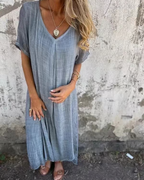 Vestido midi de algodón y lino con escote en V®