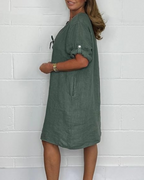 Vestido de lino con mangas largas y elegantes botones