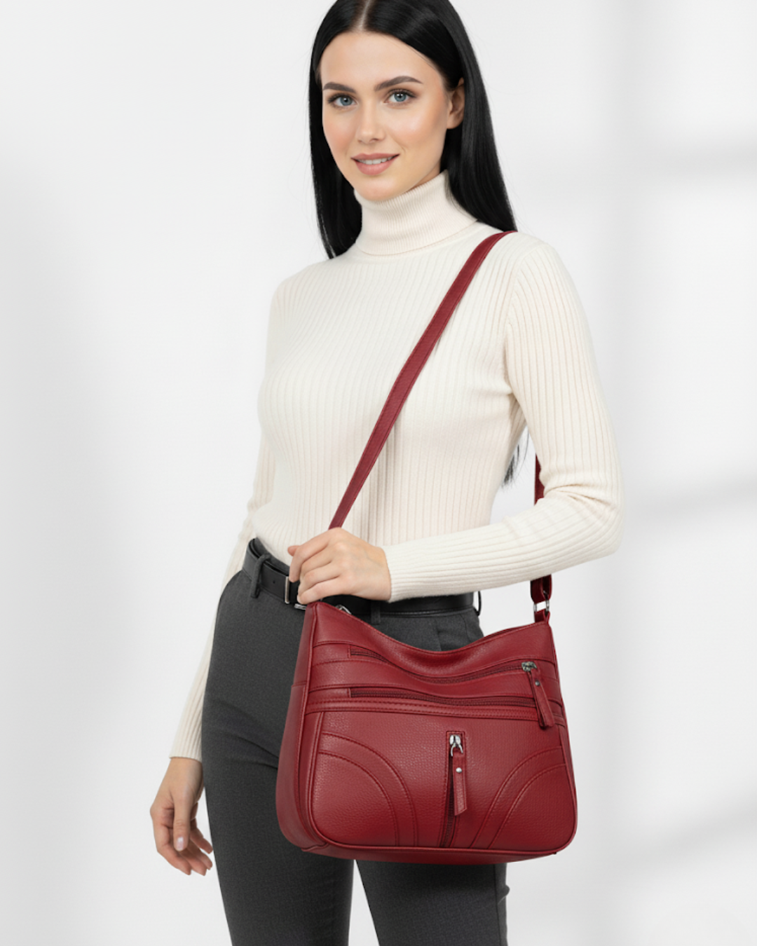 Bolso con múltiples compartimentos y textura suave®